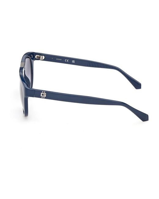 Sunglasses di Guess in Blue da Uomo