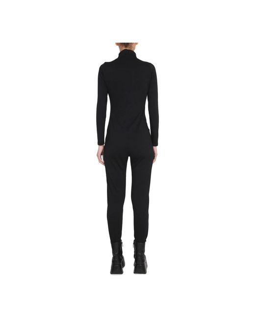 Jumpsuits Raf Simons en coloris Black