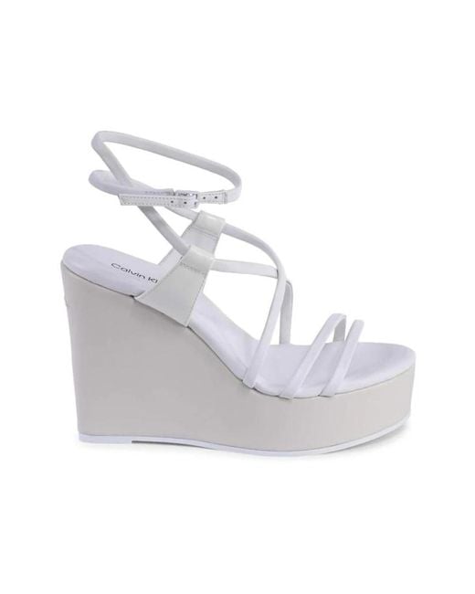 Calvin Klein Gray Riemchen Keilabsatz Sandalen Für Erhöhten Stil