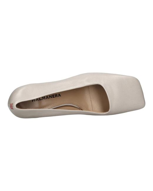 Halmanera White Pumps