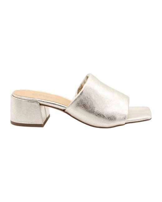 Heeled Mules di CTWLK in White