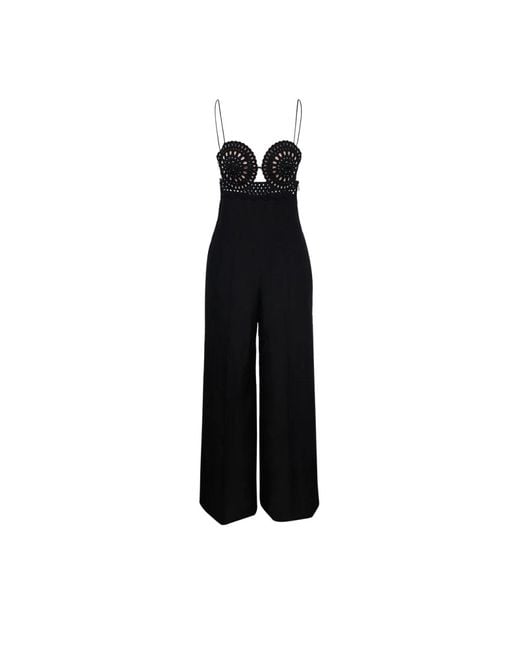 Jumpsuits Stella McCartney en coloris Black