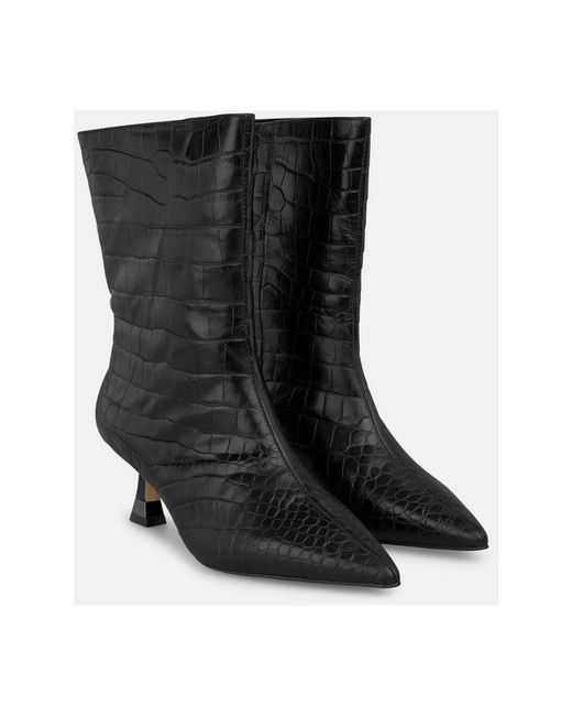 Alma En Pena. Black Heeled Boots