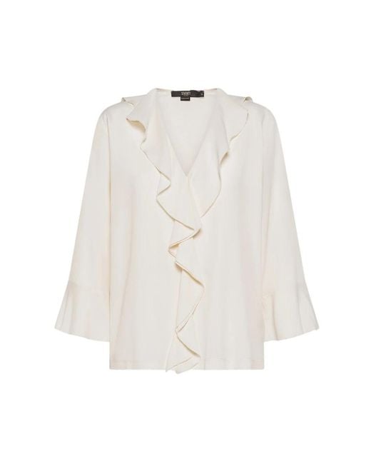 Seventy White Blouses