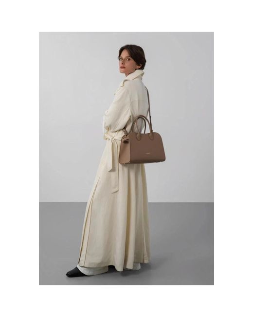 Handbags di Lancaster in Brown