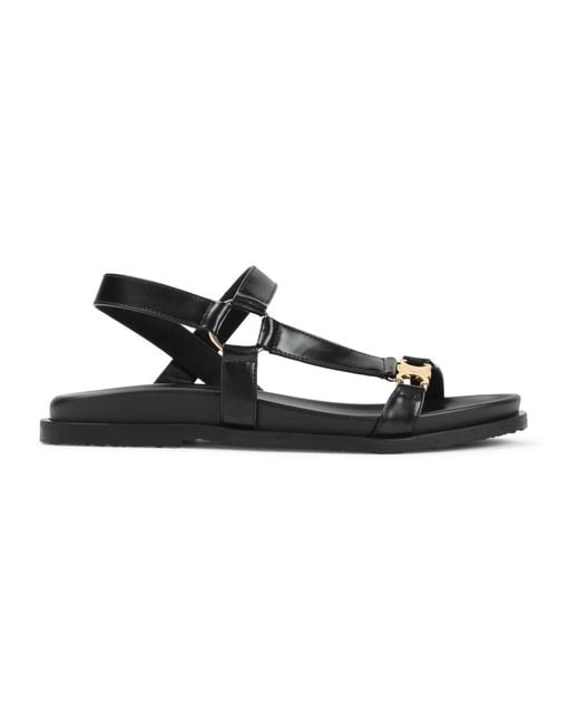 Flat Sandals Céline de color Black