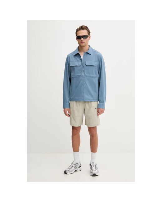 Helly Hansen Escape Lightweight Jacket in het Blue voor heren