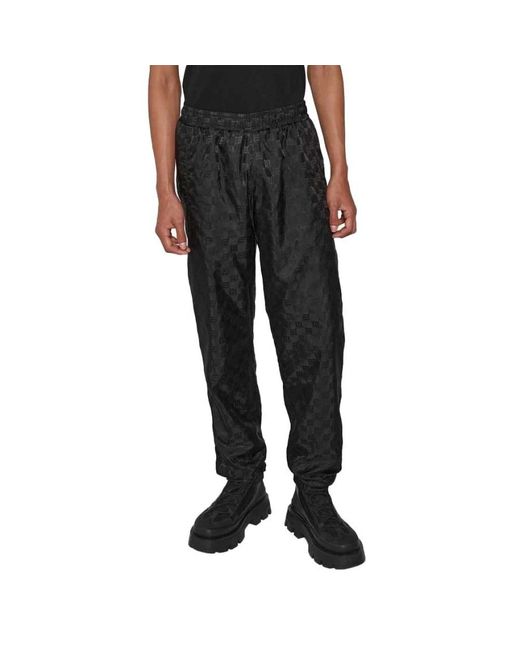 Pantaloni da allenamento in nylon monogram nero di M I S B H V in Black da Uomo