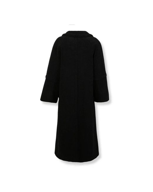 Double-Breasted Coats Herno de color Black