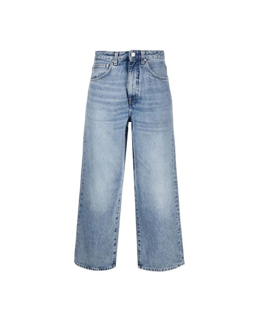 Jeans a vita alta e gamba larga in blu sbiadito di Totême  in Blue