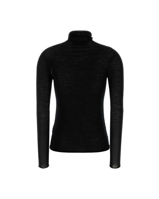Carven Black Turtlenecks