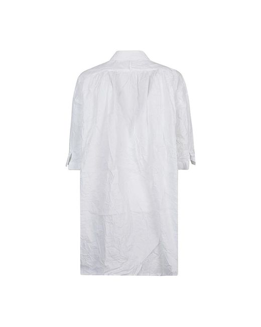 Liviana Conti White Tunics