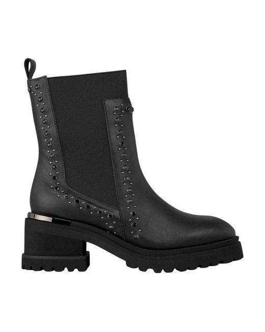 Alma En Pena. Black Heeled Boots