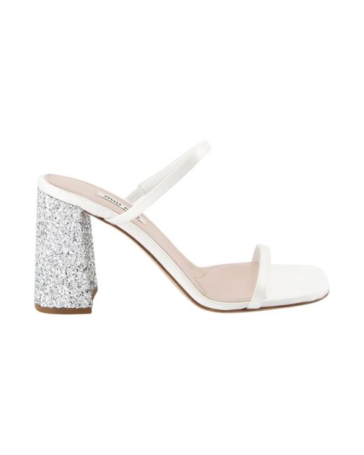 Mules de purpurina Miu Miu de color White