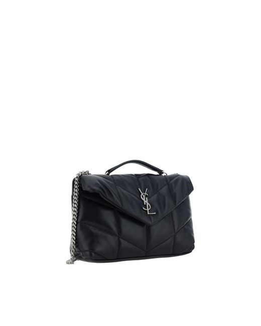 Handbags Saint Laurent de color Blue