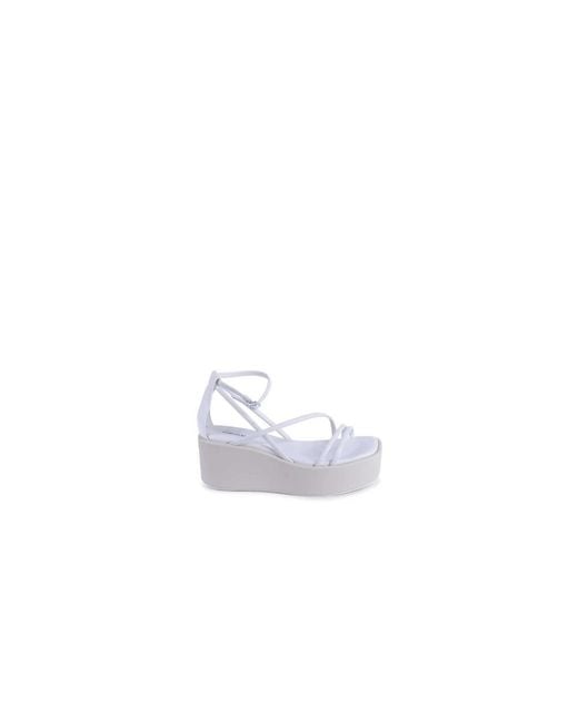 Calvin Klein White Wedges