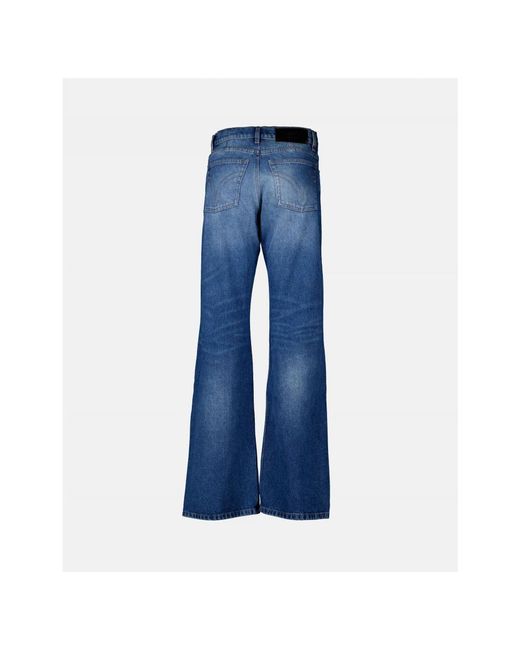 AMI Blue Ausgestellte jeans in verwaschenem blauem denim