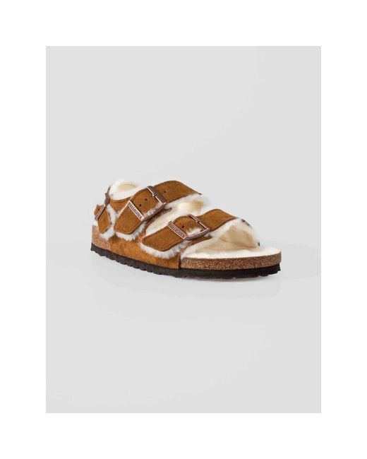 Flat Sandals di Birkenstock in Brown