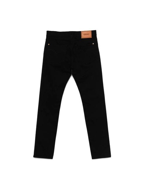 Slim-Fit Jeans Versace pour homme en coloris Black