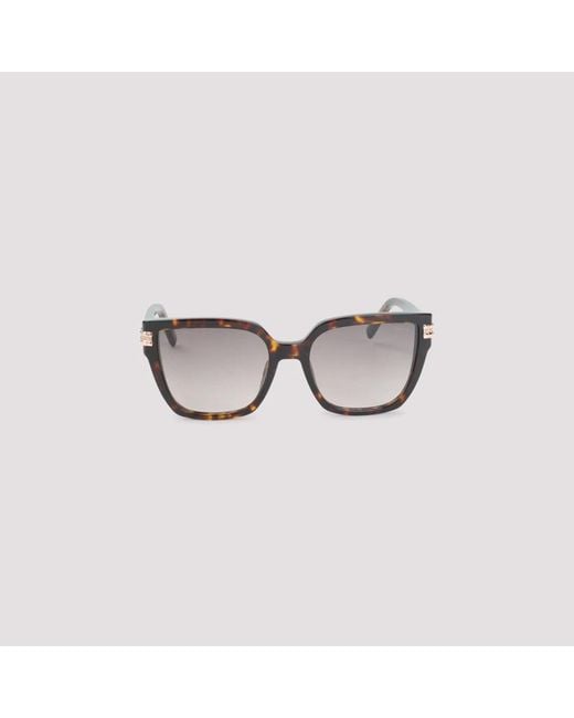 Sunglasses Chopard en coloris Brown