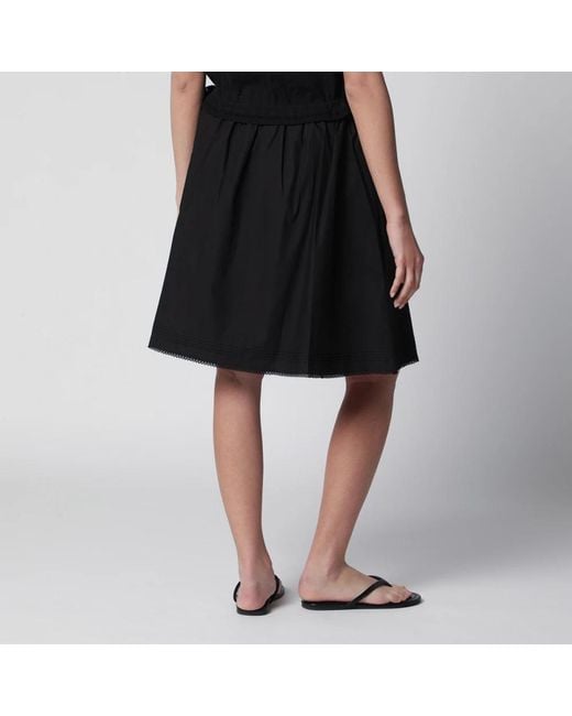 DUNST Black Short Skirts