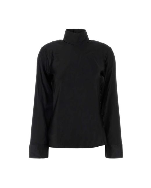 Blouses Courreges de color Black