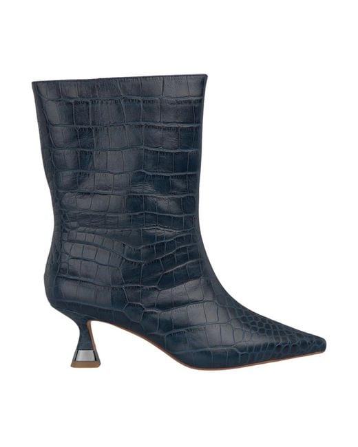 Alma En Pena. Blue Heeled Boots
