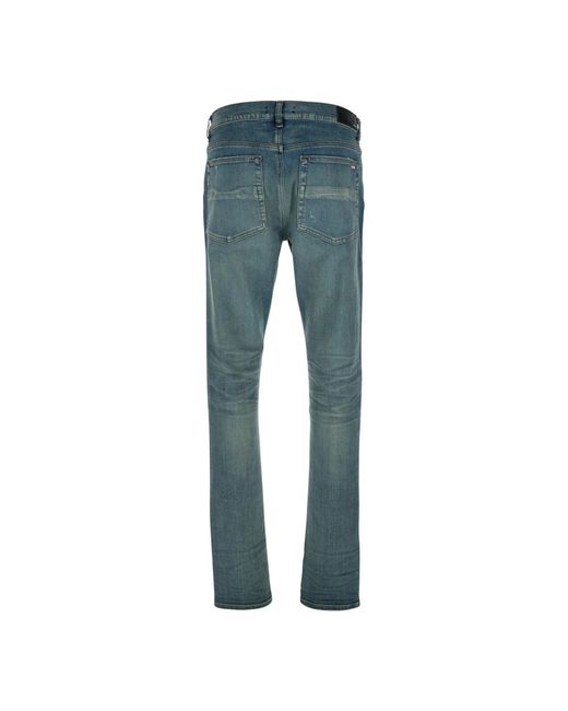 Amiri Blauwe Ripped Denim Jeans Met Logo Patch in het Blue voor heren