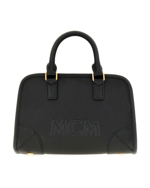 Handbags MCM en coloris Black