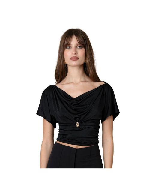 Blouses GUAJA. de color Black