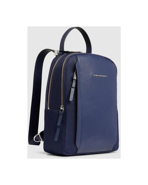 Piquadro Blue Backpacks