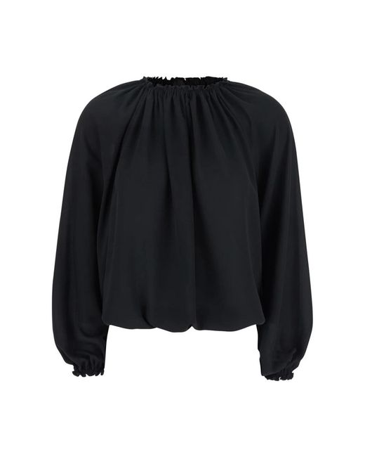 Blouses Plain en coloris Black