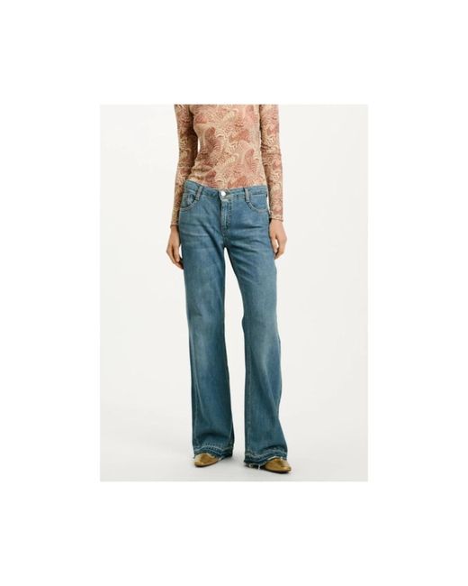 Momoní Blue Stone washed denim low rise flared jeans