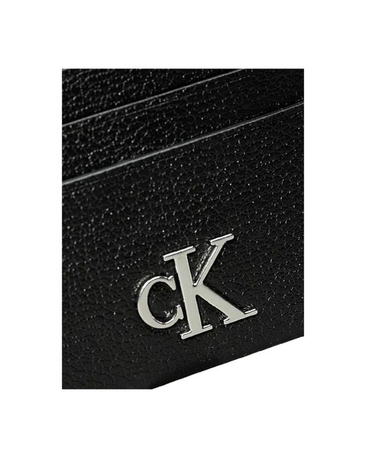 Wallets & Cardholders Calvin Klein de color Black
