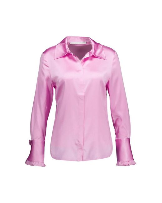 Blusa in seta ed elastan con volant di Herzensangelegenheit in Pink
