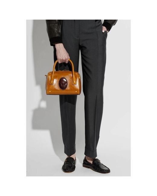 Handbags di Versace in Brown