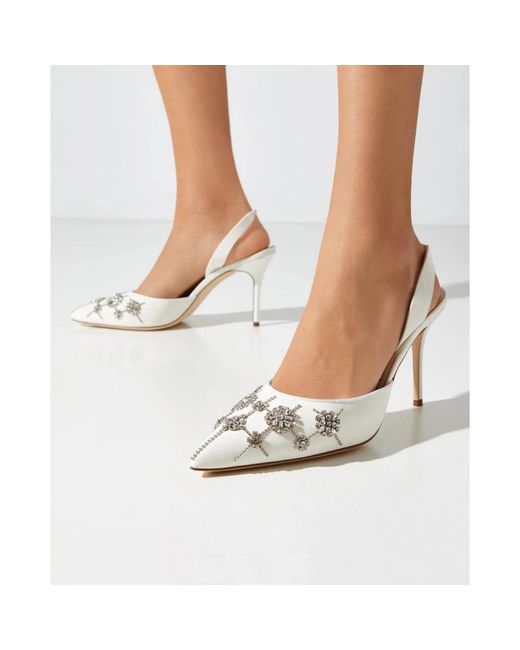 Manolo Blahnik Metallic Pumps