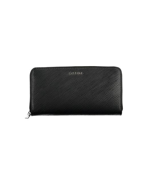 Wallets & Cardholders Calvin Klein de color Black