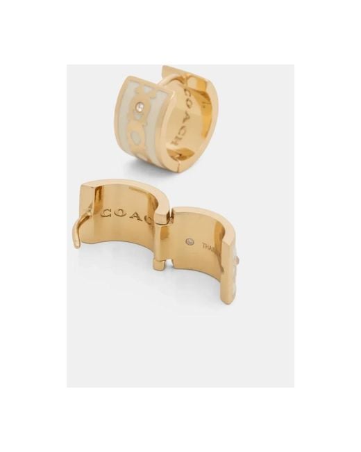 Earrings di COACH in Yellow