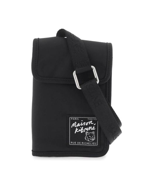 Cross body bags Maison Kitsuné de hombre de color Black