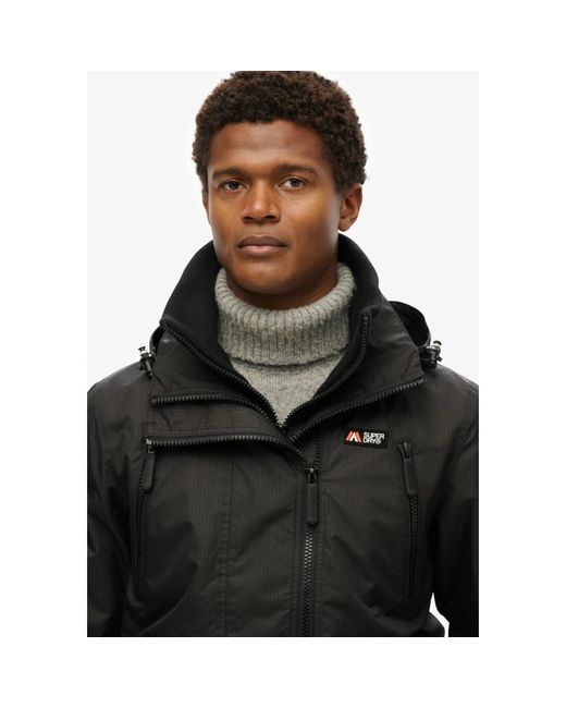 Winter Jackets di Superdry in Black da Uomo