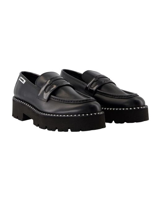 CAREL PARIS Zwarte Leren Platte Schoenen Met Messing Details in het Black