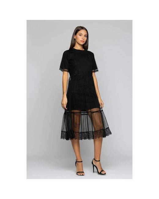 Midi Dresses Kocca en coloris Black