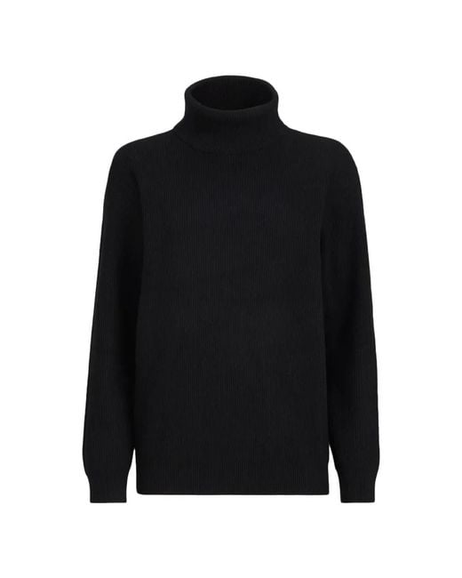 Brunello Cucinelli Black Turtlenecks