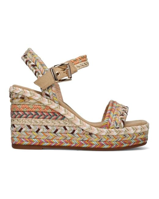 Alma En Pena. Metallic Wedges