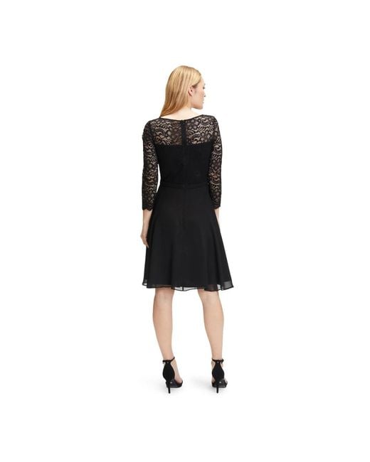 Vera Mont Black Abendkleid mit spitze,spitzenabendkleid mit modernen details,spitzen abendkleid a-linie stil