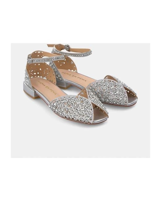 Alma En Pena. Metallic Flat Sandals