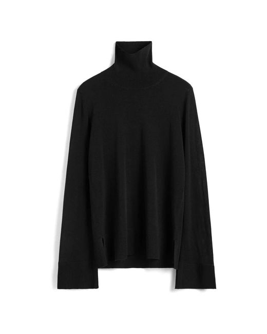 Totême Black Turtlenecks