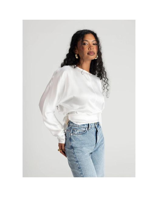 GUAJA. Kimonos in het White