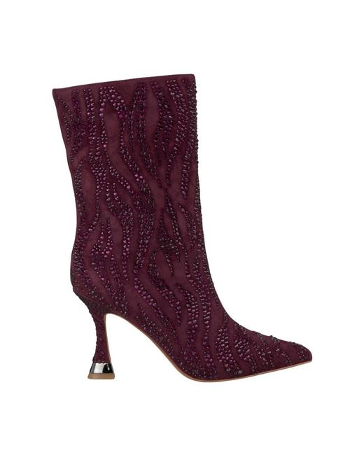 Alma En Pena. Purple Heeled Boots